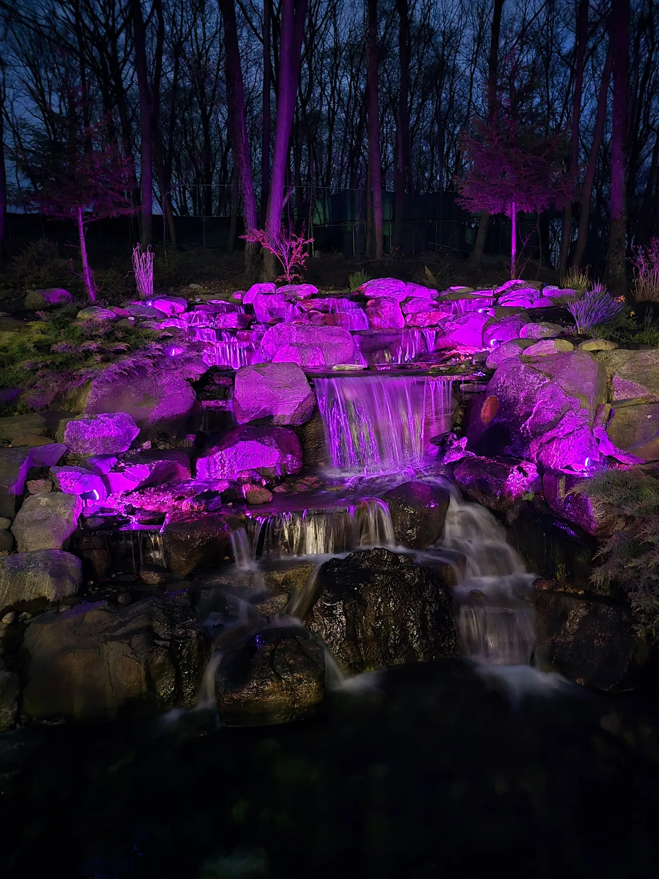 Color landscape lighting on a waterfall
